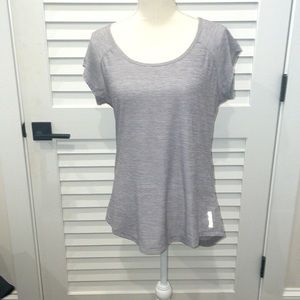 Ladies large Reebok athletic tshirt. Size large with cut out opening in back